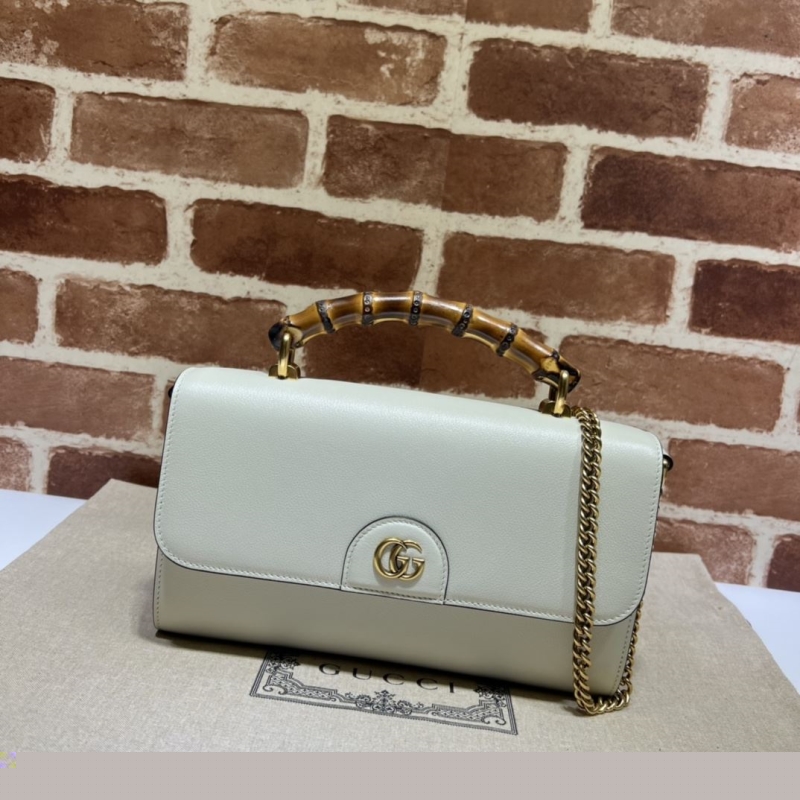 G*u*i top handle bags